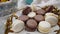 Sweet macaroons on the festive table in a beautiful plate