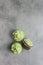 Sweet muffins with pistachio icing. Sweet dessert on kitchen table