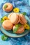 Sweet passion fruits macaroons as a tasty small snack