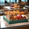 Sweet pastries with berries. Showcase in a candy store. Glass stand with cake eclairs and tartlets.