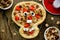 Sweet pizza in the form of funny skull to treat kids at Halloween party