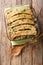 Sweet Plantain Lasagna close-up in a baking dish. Vertical top view