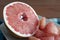 Sweet pomelo peeled on a plate