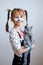 Sweet portrait of a cute little girl with a cat