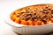Sweet potato casserole topped with marshmallows in baking dish on a table. Festive winter dish served for Thanksgiving Day family