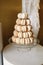 Sweet pyramid of the french macarons or macaroon for the birthday, event or wedding. selective focus