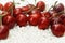 Sweet red cherries on white textile background