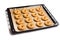 Sweet ring biscuit on baking tray