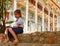 Sweet School Girl in Uniform Ouside Temple in Rural Cambodia