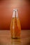 Sweet seed drink in glass Bottles on brown background