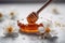 Sweet Shots: Capturing the Beauty of Manuka Honey with a Honey Dipper and Flower in Stunning Photography against a Light