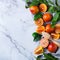 Sweet sicilian blood oranges on a marble table