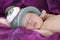 Sweet soft tenderness of innocent newborn baby sleeping