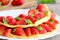 Sweet strawberry omelette. Delicious omelette stuffed with strawberries and garnished with mint leaves on a plate