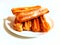 sweet sugared churros, traditional Argentine fried dough pastry, isolated on a white background