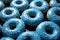 Sweet symmetry blue donuts create an enticing pattern against a visually captivating background