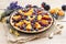 Sweet tart with peaches, plums and blueberries