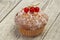 Sweet tasty muffin with red currants