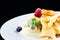 Sweet tasty pancake blinis with ice-cream, berries and mint in w