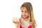 Sweet treasure. Girl calm face carefully holds sweet donut in hand, isolated white. Kid girl with long hair likes donuts