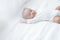 Sweet two month old newborn baby boy sleep on white sheet bed,asian little baby napping in bed at home