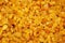 Sweet yellow raisins ingredient close-up background