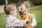 Sweet Young Brother and Sister At the Pumpkin Patch