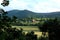 Sweetheart Abbey in a hill view landscape.