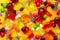 Sweetness background. Candy assorted layout. . Chewy marmalade and small caramels . Bright background. Sweets for every taste. An