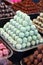 Sweetness balls build as a pyramid for sle in a pastry shop