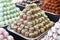 Sweetness balls build as a pyramid for sle in a pastry shop