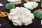 Sweets: meringues and jelly hearts, white orchid flowers, salty Bretzel