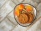 Sweets and nuts on a small rectangular plate, oatmeal cookies and heart-shaped marmalade