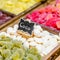 Sweets stand exposing colorful comfit in a market