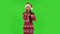 Sweety girl in Santa Claus hat very shocked then upset. Green screen