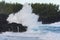 Swell rolling over volcanic rocks at Reunion Island