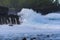 Swell rolling over volcanic rocks at Reunion Island