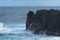 Swell rolling over volcanic rocks at Reunion Island