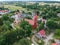 Swieszyno city, aerial view on main road, buildings and red brick church