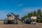 Swift Current, SK/Canada- May 15, 2020: Farmers loading seed and fertilizer from the Super B into Bourgault air drill for seed