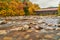 Swift River and old covered bridge at autumn