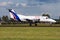 Swiftair Embraer 120 EC-IMX cargo plane landing at Amsterdam Schipol Airport