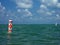 Swim area buoy against expanse of water