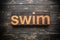 Swim Concept Vintage Wooden Letterpress Type Word