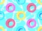 Swim ring seamless pattern. Inflatable pool rings, top view. Multi-colored inflatable circles for swimming on the water. Design
