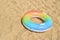 Swim tube or rubber ring on the sand