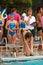 Swimmer Dives Off Platform To Swim Relay Race