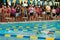 Swimmer Does Backstroke As Onlookers Watch