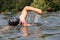 Swimmer doing forward crawl swimming stroke