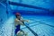 Swimmer Holding Breath Underwater